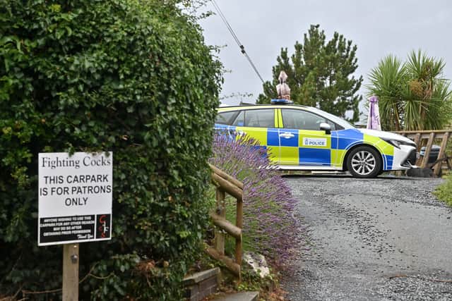 Police attended the Fighting Cocks Inn after the tragedy on July 14