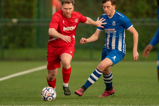Action from Shawbury United's heavy defeat at Stafford Town. Pic: Kieran Stoddart