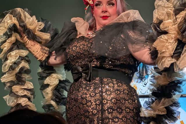 Titsalina Bumsquash performing her show girl routine in Act 3