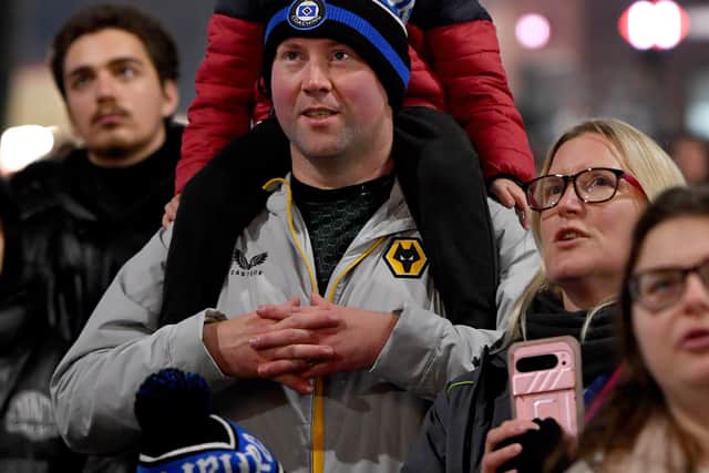 Young Wolves fan takes in the fun.