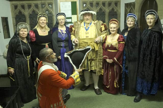Henry VIII with his Wives and Rugeley Town Crier Adrian Basford paying his respects to the King.