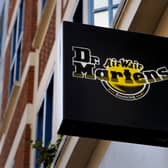 Dr Martens has revealed annual profits slumped as sales came under pressure and it cautioned over ongoing falling revenues in the UK.