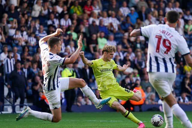 Jack Rudoni lashes in a winner for Huddersfield at The Hawthorns in 2023 (PA) 