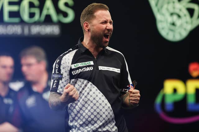 Danny Noppert celebrates beating Michael van Gerwen in the second round of the Mr Vegas Grand Slam of Darts (Picture: Kieran Cleeve/PDC)