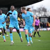 Daniel Kanu celebrates his goal for Walsall at Harrogate (Owen Russell)