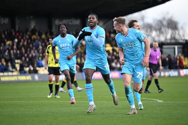 Daniel Kanu celebrates his goal for Walsall at Harrogate (Owen Russell)