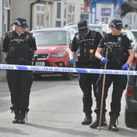 Alleged double murderer was arrested applying for fake passport after two men shot in Wolverhampton, jury told
