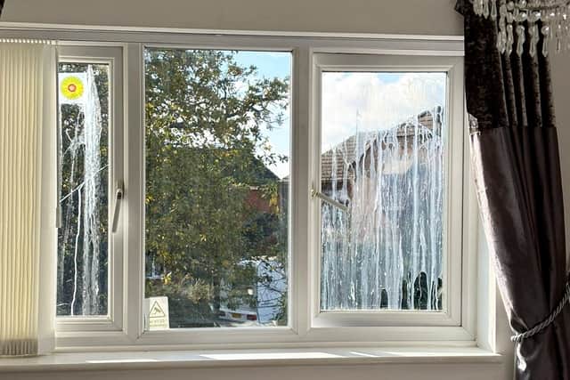 Egg yoke on the windows of Celine Lockyer's Worcester home.