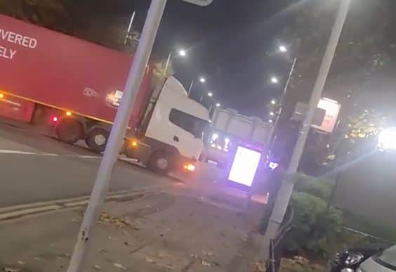 Watch as stolen earthmover smashes past Royal Mail lorry on ...