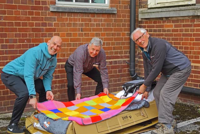 Chris Young , David Marklew from Cannock Rotary Club alongside Gwyn Williams from Stafford Rotary