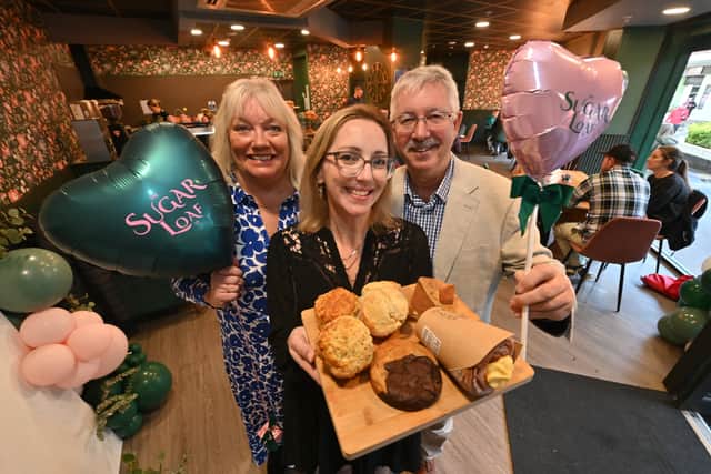 The Sugar Loaf in Stourbridge has re-opened. Pictured - tearoom owner Charlie Mainprice with mom and dad Mandy and Jon Mansell.