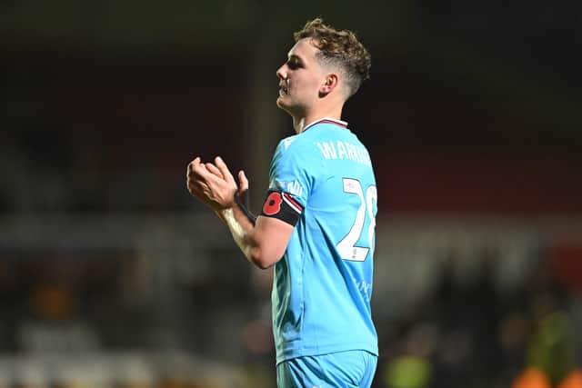 Walsall midfielder Lewis Warrington made his return from an ankle injury as a late substitute.
