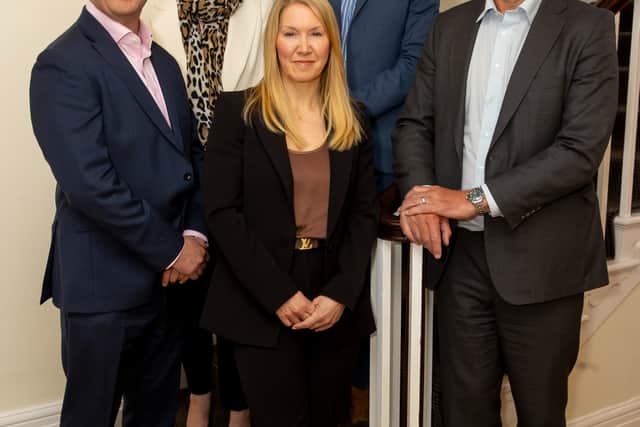 Front, from left: Chris Piggott, Sally Morris and Tim Lang. Back are Beverley Smith and Darryll Thomas