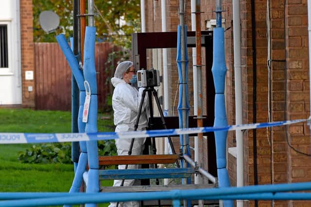 Police and scene of crime officers at Lilleshall Crescent, Wolverhampton, after a murder inquiry is launched after man is shot dead.
