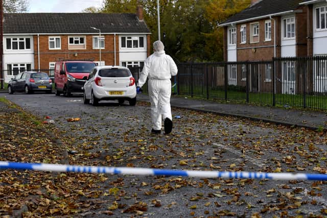 Police and scene of crime officers at Lilleshall Crescent, Wolverhampton, after a murder inquiry is launched after man is shot dead.