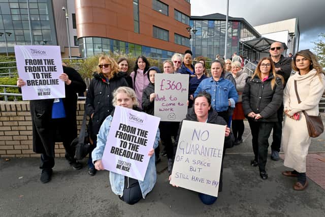 Hospital workers hold a protest outside Walsall Manor Hospital, after being told they will have to pay to park their car for work.