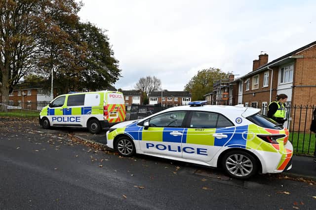 Police and scene of crime officers at Lilleshall Crescent, Wolverhampton, after a murder inquiry is launched after man is shot dead.