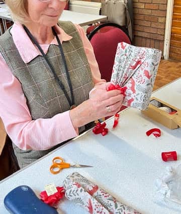 Helen Hallchurch with her gift wrapping