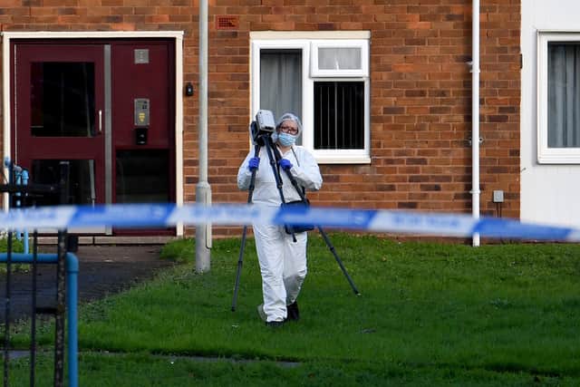 Police and scene of crime officers at Lilleshall Crescent, Wolverhampton, after a murder inquiry is launched after man is shot dead.