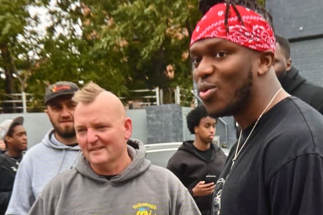 The Volksmagic team met with KSI (right) to autograph the car, which is set to be raffled off for charity this weekend. Photo: Steve Leath