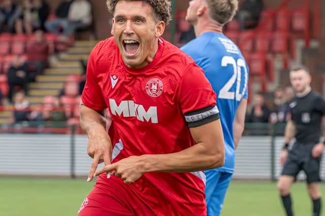 Stafford Town's Matt Hearsey celebrates his FA Vase hat-trick against Nuneaton. Pic: Jim Wall.