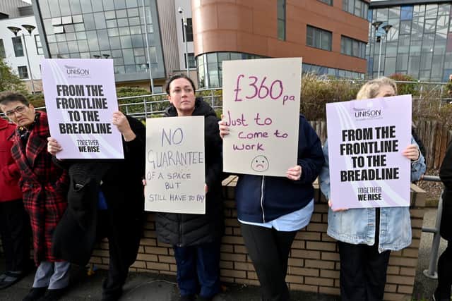 Hospital workers hold a protest outside Walsall Manor Hospital, after being told they will have to pay to park their car for work.