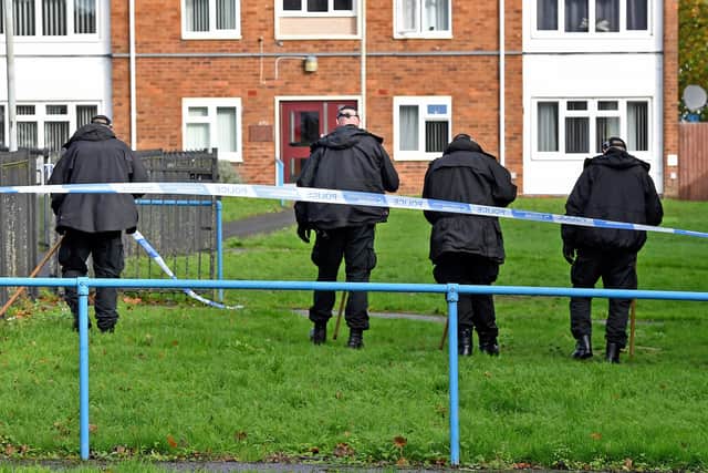 Police and scene of crime officers at Lilleshall Crescent, Wolverhampton, after a murder inquiry is launched after man is shot dead.