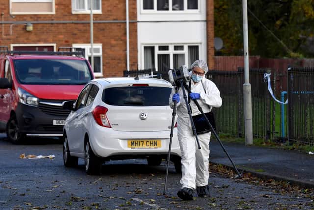 Police and scene of crime officers at Lilleshall Crescent, Wolverhampton, after a murder inquiry is launched after man is shot dead.
