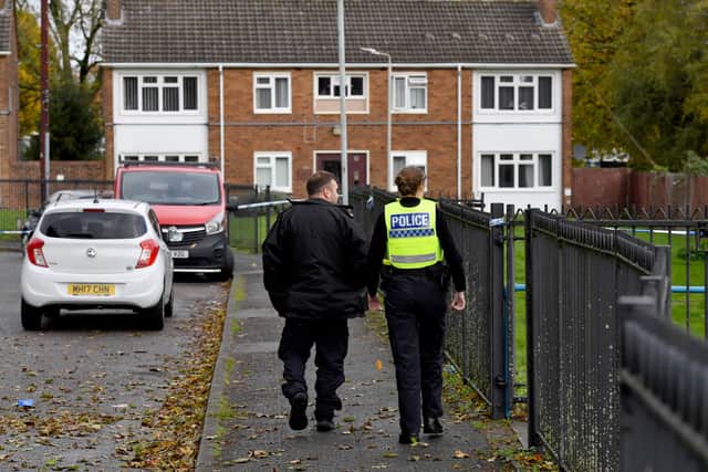 Police and scene of crime officers at Lilleshall Crescent, Wolverhampton, after a murder inquiry is launched after man is shot dead.