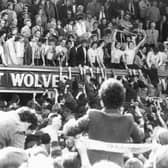 May 1983 - Wolves players throw their shirts to the crowd after winning promotion to the First Division of the Football League 