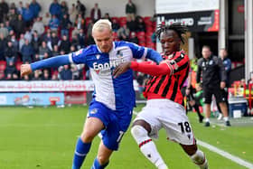 Walsall left wing-back Vincent Harper has been called up by Kenya.