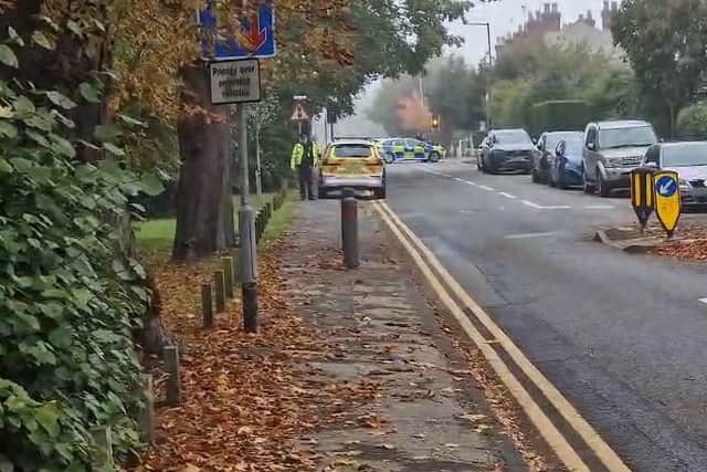 Police in Corporation Street, Stafford, after two children were pronounced dead early on Sunday