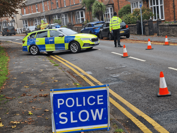 Police in Corporation Street, Stafford, after two children were pronounced dead early on Sunday