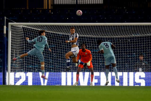 Albion defender Evan Humphries rises highest to head clear in the win over Juventus. (Photo by Adam Fradgley/West Bromwich Albion FC via Getty Images)