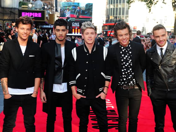 Liam, right, with One Direction on the red carpet in London's Leicester Square
