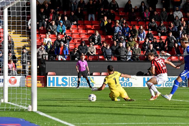 Aaron Pressley scores his second goal.