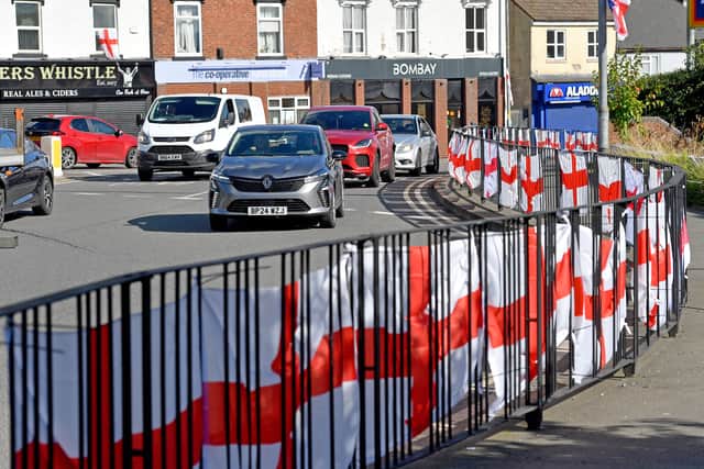 The council has said that the flags won't be taken down unless they post a risk to drivers, or until they deteriorate