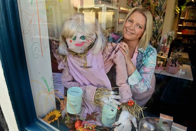 Rebecca Stone's scarecrow self-portrait at The Grove salon