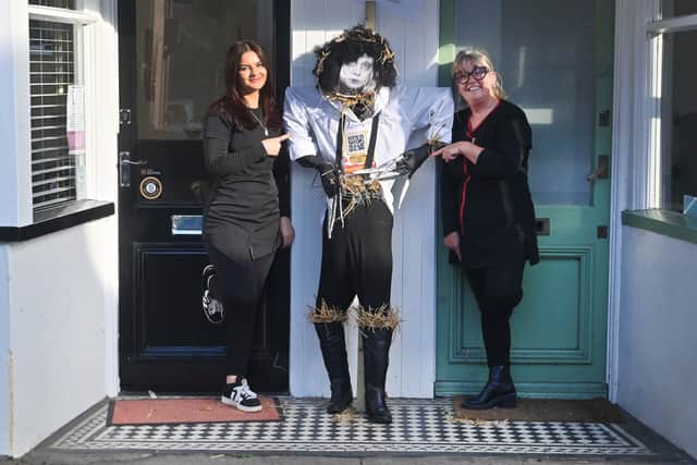 Honey James and Tracy Stubbs of TJ Salon with scarecrow Edward Scissorhands