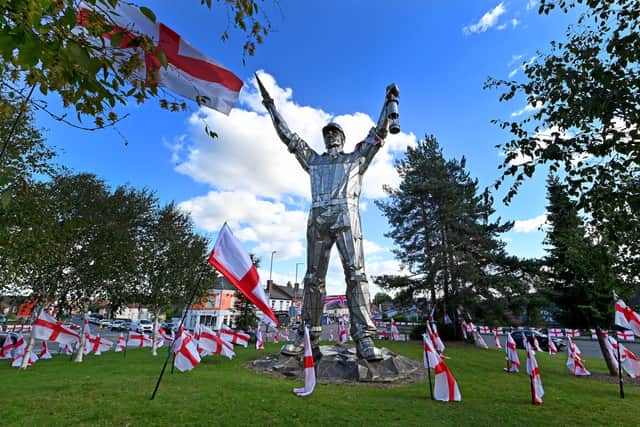 WALSALL COPYRIGHT NATIONAL WORLD TIM THURSFIELD -22/09/25A huge number of England flags have been placed on and around 'Jigger Island' in Brownhills.