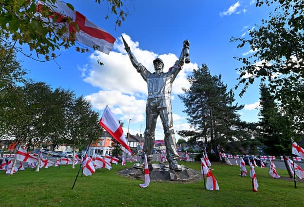 WALSALL COPYRIGHT NATIONAL WORLD TIM THURSFIELD -22/09/25A huge number of England flags have been placed on and around 'Jigger Island' in Brownhills.