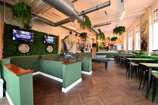 The games room features darts, pool and shuffleboard, but with a modern twist