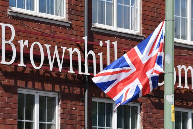 Scores of flags have been placed around Brownhills. Photo: Tim Thursfield
