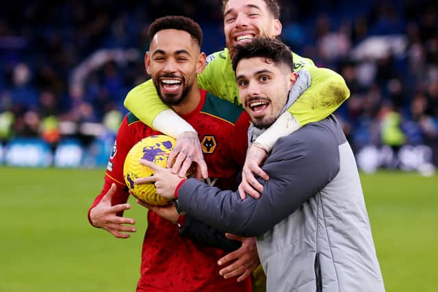 Matheus Cunha celebrates with the match ball after Wolves' 4-2 win against Chelsea at Stamford Bridge in February 2024. (Photo by Jack Thomas - WWFC/Wolves via Getty Images).
