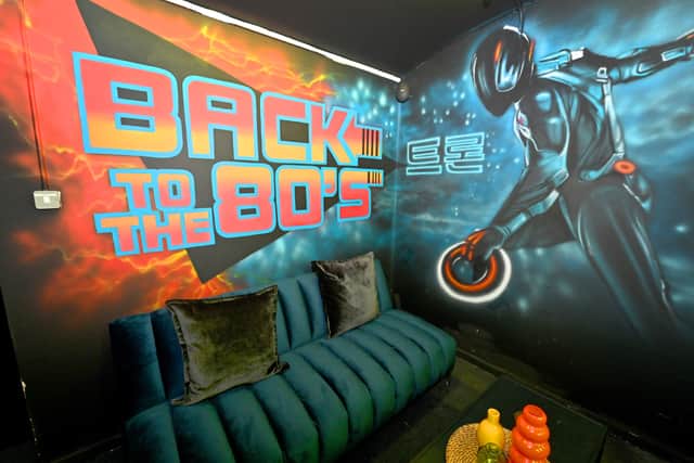 The venue also includes plenty of gaming themed surroudnings, including this 'Back to the 80s' mural