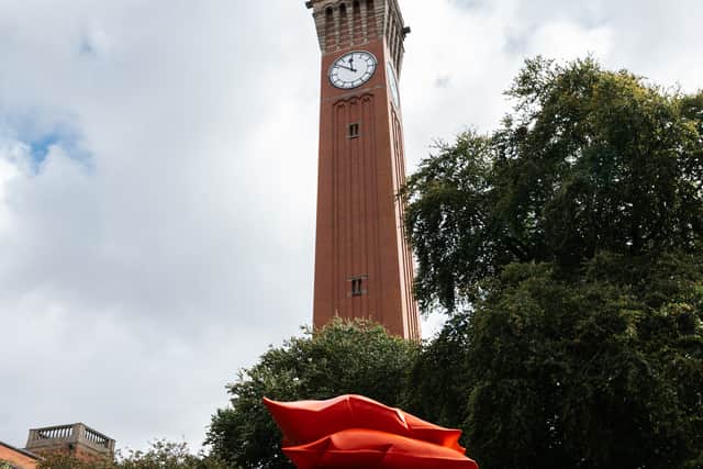 Red Stack by Shaikha Al Mazrou on Chancellor’s Court at the University of Birmingham, Edgbaston campus with Old Joe.