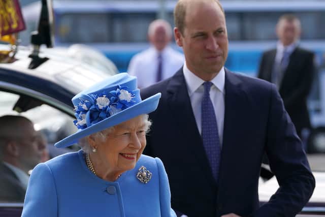 Queen Elizabeth II and the Duke of Cambridge during a visit to AG Barr's factory in Cumbernauld, where the Irn-Bru drink is manufactured