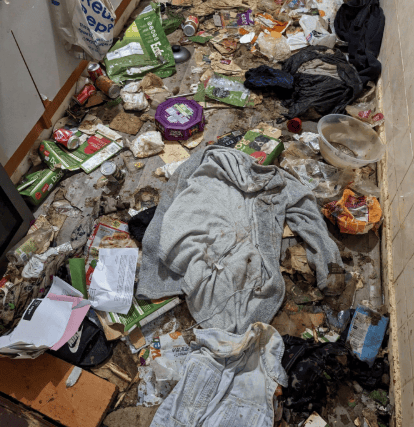 No food or water was found in the home, which was found to be cramped an filled with feaces