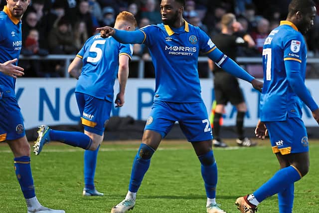 Chey Dunkley celebrates for Shrewsbury Town (AMA)