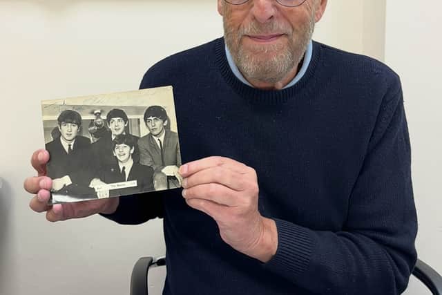 The signed photograph is expected to sell for between £1,500 to £2,000 at auction